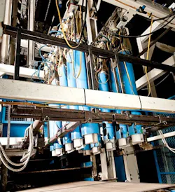 Blade cutters on the Split-Impact machine (shown above) were outfitted with Airbox controls on each pneumatic head and linked v Blade cutters on the Split-Impact machine (shown above) were outfitted with Airbox controls on each pneumatic head and linked v