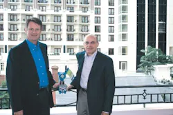 Emerson Process Management executives Steve Sonnenberg (left) and John Berra show one of the 70 instruments installed at the Exc Emerson Process Management executives Steve Sonnenberg (left) and John Berra show one of the 70 instruments installed at the Exc