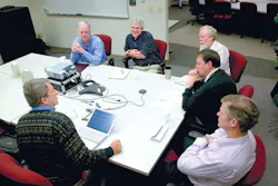 Automation World Editor in Chief Gary Mintchell, bottom left, talks with (left to right) Automation World Editor in Chief Gary Mintchell, bottom left, talks with (left to right)