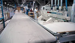 Customized machinery has helped Kent Moore Cabinets boost productivity by about 120 percent over the past 10 years.