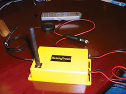 Fobs (top) worn by pipeline technicians and truck-mounted base units (left) are components of the Remote Reach system, says Dow' Fobs (top) worn by pipeline technicians and truck-mounted base units (left) are components of the Remote Reach system, says Dow'