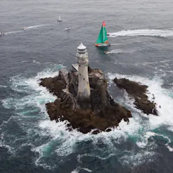 Groupama Sailing Team, skippered by Franck Cammas from France and CAMPER with Emirates Team New Zealand, skippered by Chris Nicholson from Australia, rounding Fastnet Rock. Photo credit: IAN ROMAN/Volvo Ocean Race Groupama Sailing Team, skippered by Franck Cammas from France and CAMPER with Emirates Team New Zealand, skippered by Chris Nicholson from Australia, rounding Fastnet Rock. Photo credit: IAN ROMAN/Volvo Ocean Race