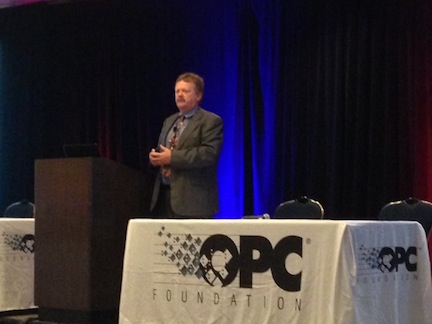 Tom Burke addressing attendees at OPC Technology Summit.
