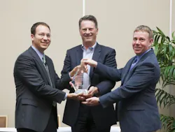 Bristol-Myers Squibb representatives Chris Stevens (left) and Dave Gleeson (far right) receive the award from Steven Sonnenberg Bristol-Myers Squibb representatives Chris Stevens (left) and Dave Gleeson (far right) receive the award from Steven Sonnenberg