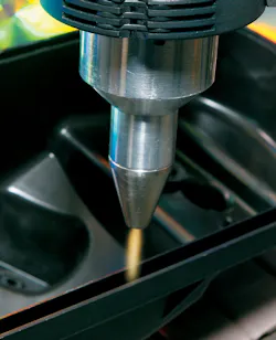Flame treatment readies an auto dashboard for adhesive. Source: Enercon Flame treatment readies an auto dashboard for adhesive. Source: Enercon