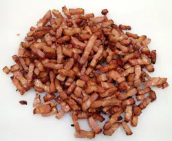 Bacon is basted and cooked in its own juices in a spiral oven, providing the appearance of a pan-fried product. Source: Unitherm