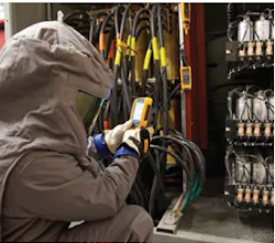Keithly Project Manager Zach Bryson uses a Fluke CNX compatible infrared camera to inspect fuses and power capacitors while the Keithly Project Manager Zach Bryson uses a Fluke CNX compatible infrared camera to inspect fuses and power capacitors while the