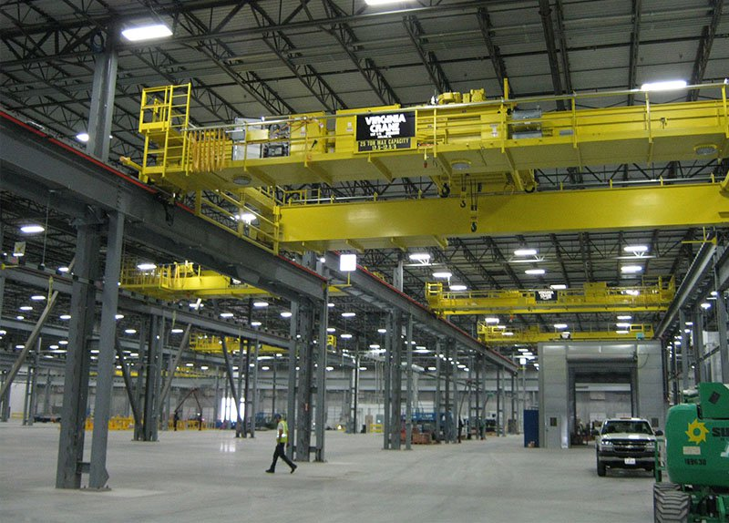 For this metal industry plant, the production goal was seven-minute cycles per crane to move metal coils weighing 1 to 20 tons.