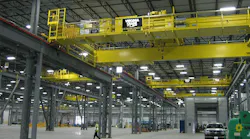 For this metal industry plant, the production goal was seven-minute cycles per crane to move metal coils weighing 1 to 20 tons.