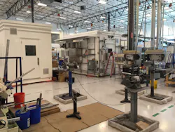 Orange pads positioned beneath the analytical equipment shelters can be pumped with air to let the buildings skate easily across the floor.
