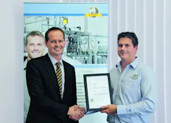 Congratulations: In Sydney, Australia Electrical engineer Rod Burton (right) from Machinery Automation & Robotics, receives the Congratulations: In Sydney, Australia Electrical engineer Rod Burton (right) from Machinery Automation & Robotics, receives the