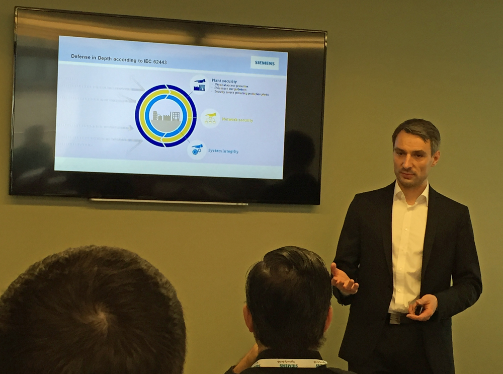 Oliver Narr explains the Defense in Depth strategy for cybersecurity to attendees of the Siemens Oil & Gas Innovations Conference.