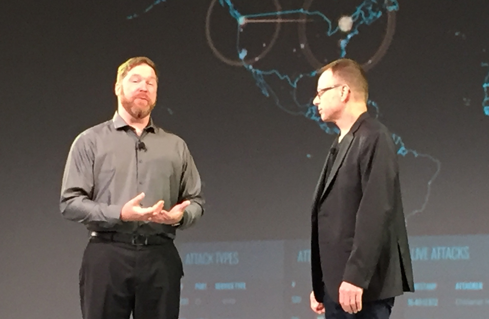 Eric Knapp (left), global director of cybersecurity solutions and technology for HPS, talks with CTO Bruce Calder about the state of cybersecurity today.