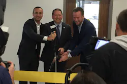 Jon DeSouza, Troy Hammond and Philip Harting (left to right) cut the ribbon at the dedication of the Harting Electronics Lab at North Central College in Naperville, Ill. Jon DeSouza, Troy Hammond and Philip Harting (left to right) cut the ribbon at the dedication of the Harting Electronics Lab at North Central College in Naperville, Ill.