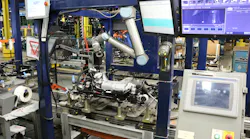 The inspection system includes a UR10 cobot and a Keyence CA-HX200C LumiTrax vision system. The inspection system includes a UR10 cobot and a Keyence CA-HX200C LumiTrax vision system.