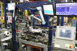 The inspection system includes a UR10 cobot and a Keyence CA-HX200C LumiTrax vision system. The inspection system includes a UR10 cobot and a Keyence CA-HX200C LumiTrax vision system.