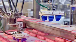 The Soft Robotics gripper, designed to mimic the human hand, gently and accurately picks up Peeps to load into trays. The Soft Robotics gripper, designed to mimic the human hand, gently and accurately picks up Peeps to load into trays.