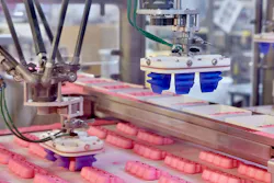 The Soft Robotics gripper, designed to mimic the human hand, gently and accurately picks up Peeps to load into trays. The Soft Robotics gripper, designed to mimic the human hand, gently and accurately picks up Peeps to load into trays.