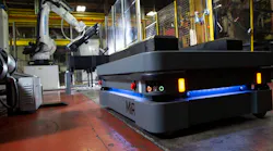 The MiR500 robot approaches the injection molding machine and its attendant robot.