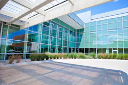 High-efficiency glass is made possible through a sputter coating line, which adds a metallic film to the glass surface. Source: AGC Glass High-efficiency glass is made possible through a sputter coating line, which adds a metallic film to the glass surface. Source: AGC Glass