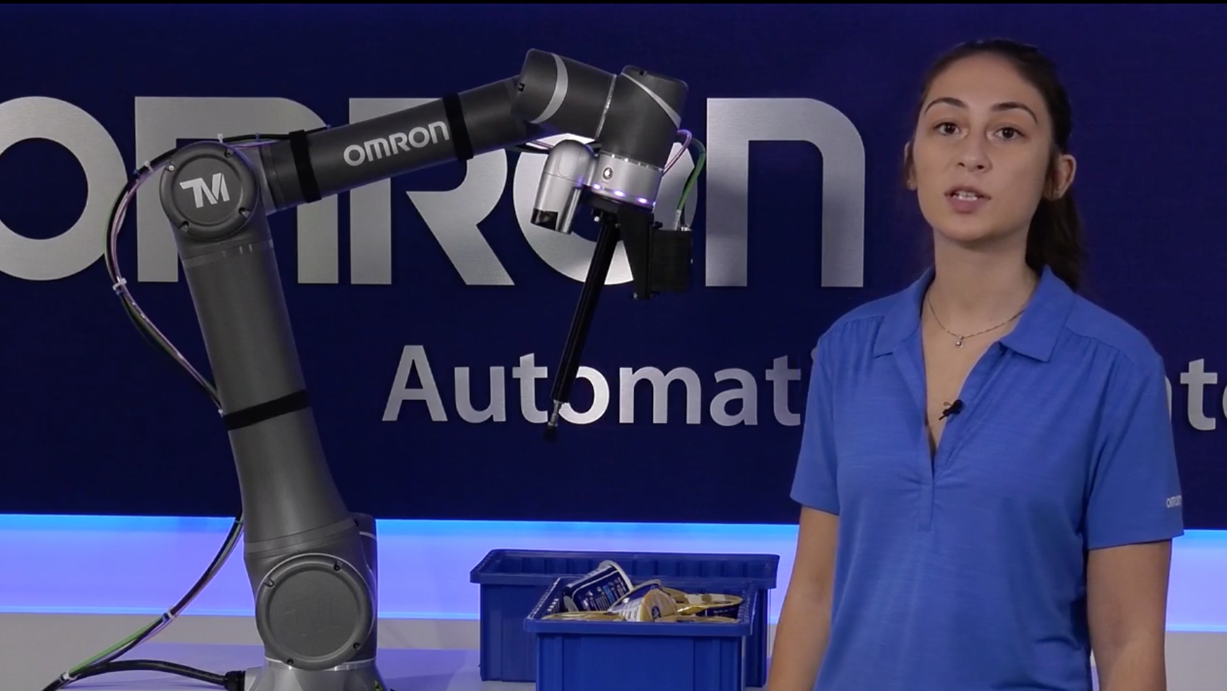 Danielle Belskis, automation engineer at Omron Automation, demonstrates the FH Series 3D camera for robotic bin picking applications.