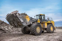 John Deere Hybrid 944K Wheel Loader distributing aggregate in Georgetown, Texas. John Deere Hybrid 944K Wheel Loader distributing aggregate in Georgetown, Texas.
