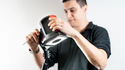 A technician calibrates an Inspekto S70 autonomous machine vision system. A technician calibrates an Inspekto S70 autonomous machine vision system.