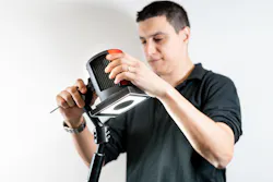 A technician calibrates an Inspekto S70 autonomous machine vision system. A technician calibrates an Inspekto S70 autonomous machine vision system.