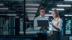 16x9 Man Woman Data Center 493462273