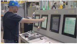 Monitoring production of GAF's EnergyGuard Polyiso Insulation—a roof insulation panel made of glass fiber reinforced cellulosic felt facers bonded to a core of polyisocyanurate foam. Monitoring production of GAF's EnergyGuard Polyiso Insulation—a roof insulation panel made of glass fiber reinforced cellulosic felt facers bonded to a core of polyisocyanurate foam.