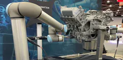 With this aid of Humatics' microlocation technology, two Universal Robots with Atlas Copco end effectors deliver torque to engine bolts as the engine moves through the assembly area without stopping. With this aid of Humatics' microlocation technology, two Universal Robots with Atlas Copco end effectors deliver torque to engine bolts as the engine moves through the assembly area without stopping.