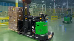 A Vecna Robotics AFL Autonomous Forklift works alongside another robot, moving goods stacked on a pallet in a warehouse distribution center. Source: Vecna Robotics.