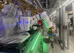 A KUKA Agilus robot outfitted with Airskin’s collaborative robot technology in the seat measurement work cell at BMW Regensburg. A KUKA Agilus robot outfitted with Airskin’s collaborative robot technology in the seat measurement work cell at BMW Regensburg.