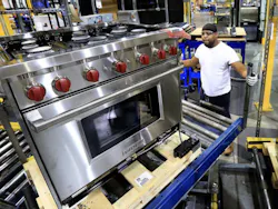 A Wolf range from Sub-Zero moving through the assembly process. A Wolf range from Sub-Zero moving through the assembly process.