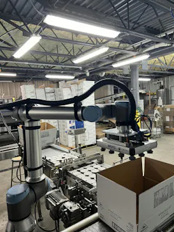 The UR10e robot at El Pinto with its custom Coval gripper, programmed to accommodate different box depths for shipping single-serve cups, as it configures each layer. The UR10e robot at El Pinto with its custom Coval gripper, programmed to accommodate different box depths for shipping single-serve cups, as it configures each layer.