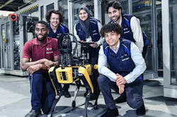 Interns with Spot at the BMW Hams Hall plant. Interns with Spot at the BMW Hams Hall plant.