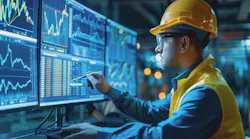 Industrial engineer reviews operational data