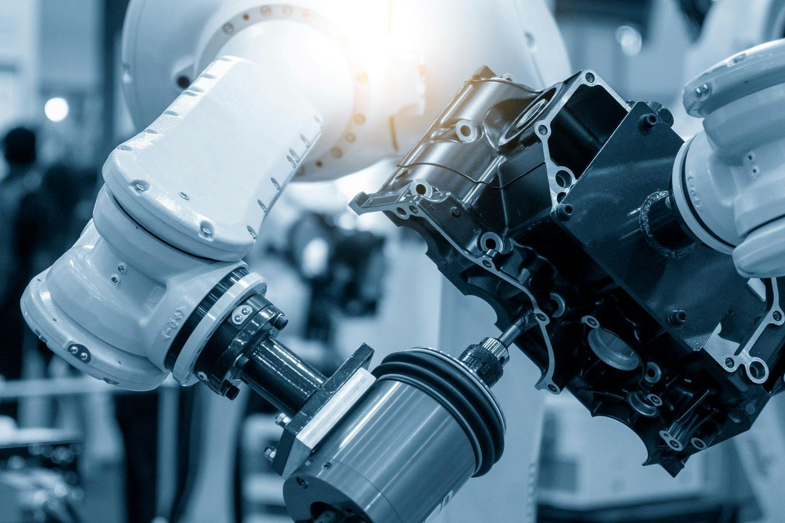 The automotive parts finishing process by milling spindle attached the robotics arm. The hi-technology automotive parts manufacturing process by robotics system.
