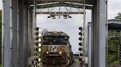 Norfolk Southern railcar being inspected with AI vision system Norfolk Southern railcar being inspected with AI vision system
