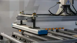 Robotic Machine Frame with Spring Assembly and Conveyor Rollers – Industrial Automation Detail