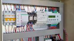 Controller, power supply, phase control relay, circuit breaker in a electrical/control cabinet. Controller, power supply, phase control relay, circuit breaker in a electrical/control cabinet.