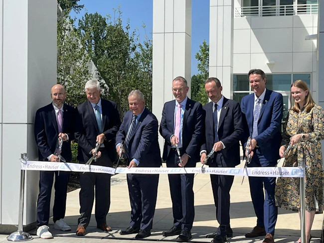 6a511628afe7706eb6a48b51 Ribbon Cutting Photo