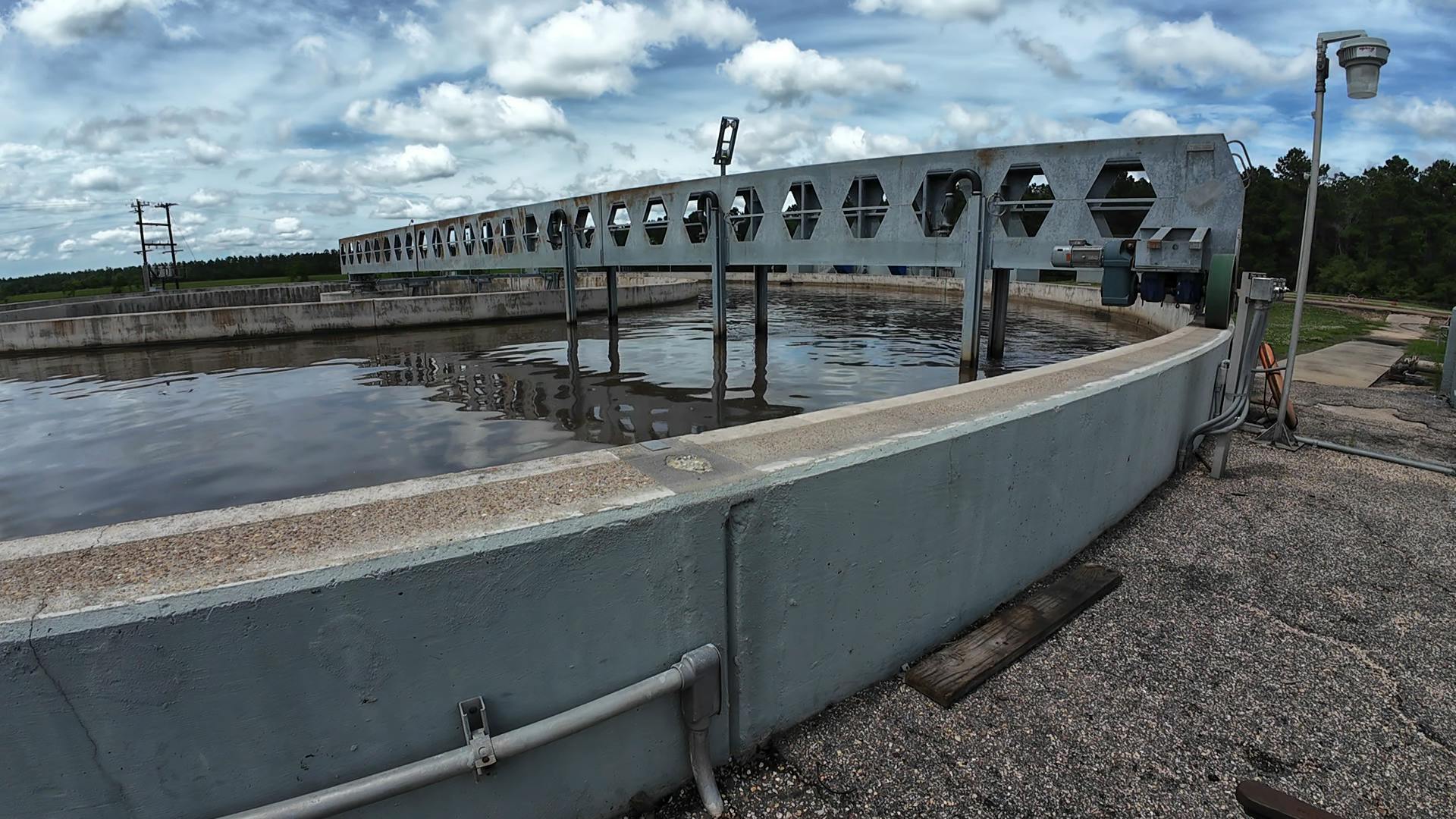 Figure 1: Each aeration basin has a rotating arm that circles the basin, oxygenating the water with attached diffuser wands.
