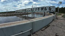 Figure 1: Each aeration basin has a rotating arm that circles the basin, oxygenating the water with attached diffuser wands.